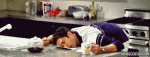 man lazing and lying over the kitchen counter