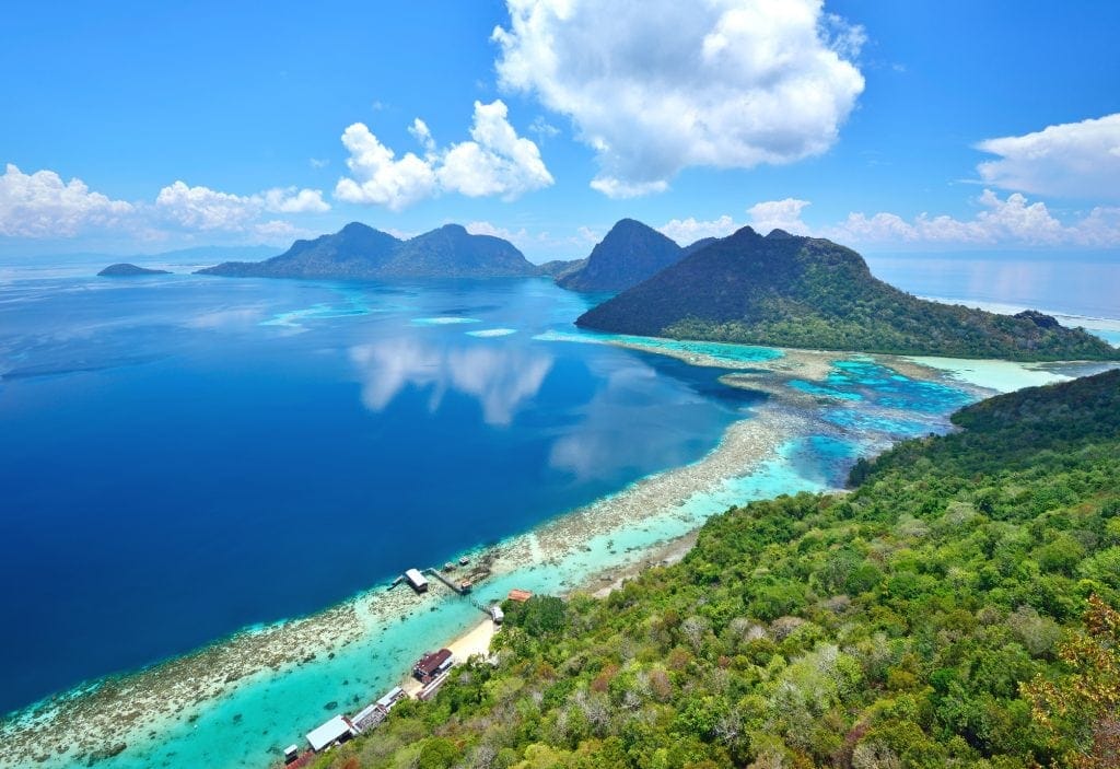 Scenic View of Bohey dulang in Tun Sakaran Marine Park tropical islands Semporna, Sabah Borneo Malaysia. Bohey dulang is an ancient volcano located in Borneo island. The surrounding area is famous for scuba diving and snorkeling. It is also close to Sipadan Island, the top 5 dive site in the world.