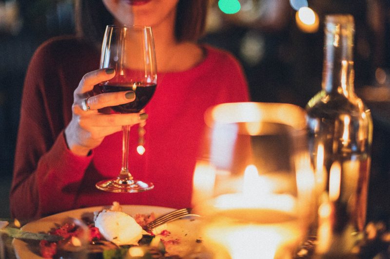 woman having wine glass