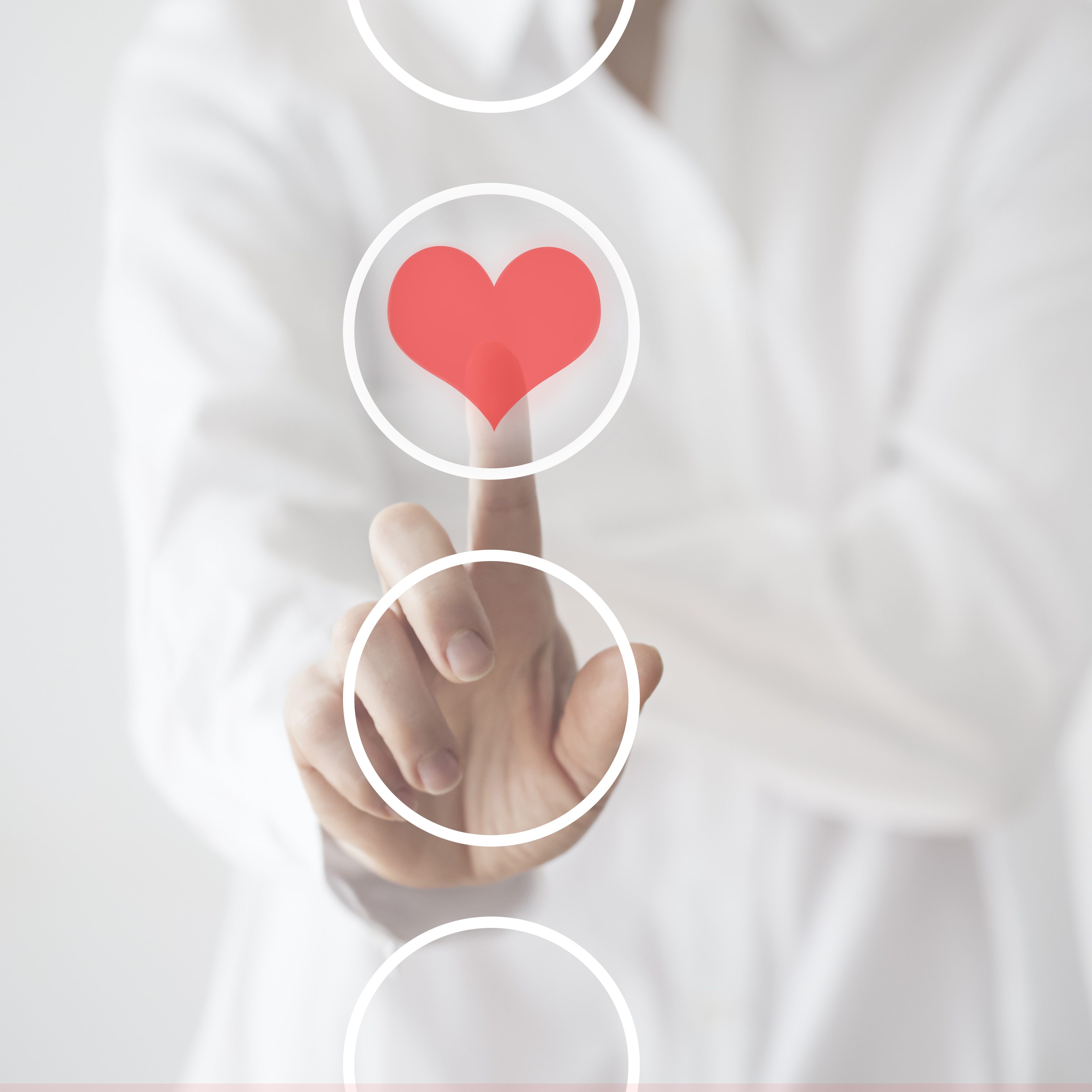 Woman touching heart icon.